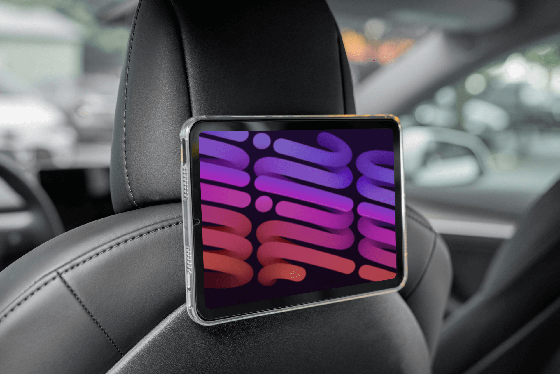JOWUA台灣MagSafe磁吸掛鉤(Model 3 2018-2024/Model Y 2021-2024)將具有磁吸功能的平板電腦牢固地安裝在汽車座椅頭枕上,展現出充滿活力的抽象設計和提升車內收納空間。.