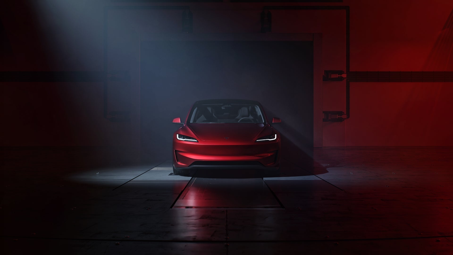 在黑暗的工業環境中，一輛紅色電動車被聚光燈照亮，突顯出它流線型的前部設計和 LED 頭燈。背景燈光昏暗，以紅色和黑色為基調。.