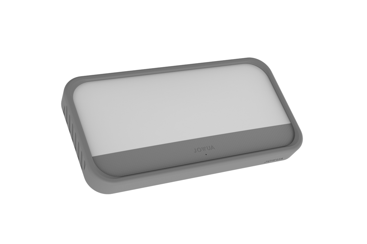 這款由台灣 JOWUA 推出的矩形灰色「萬用 MagSafe 磁吸燈」，前板為白色且邊角圓潤，其設計靈感源自特斯拉無線充電配件的流線美學，現正陳列於純白背景上。.